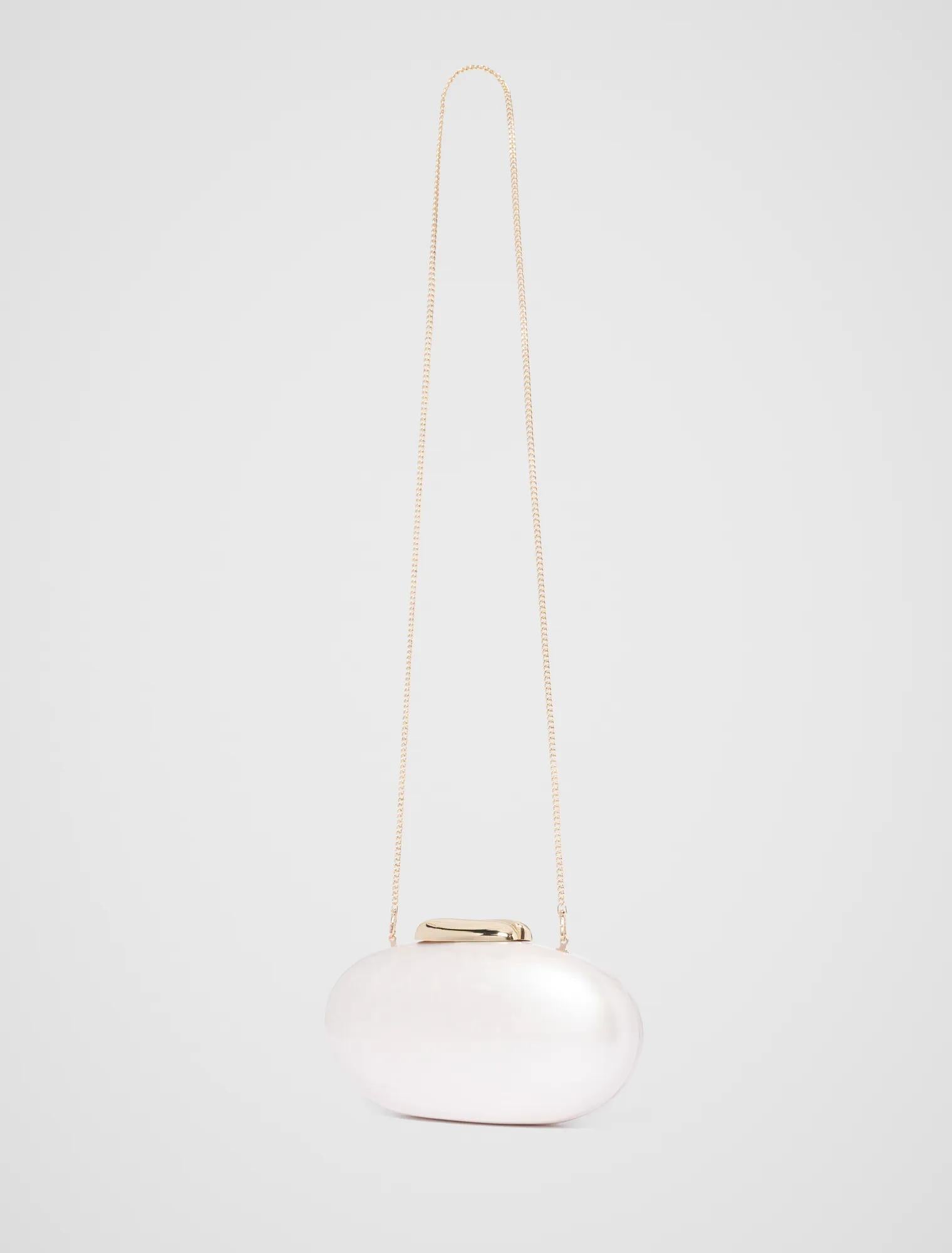 Patty Oval Pearl Hardcase Clutch_mannequin