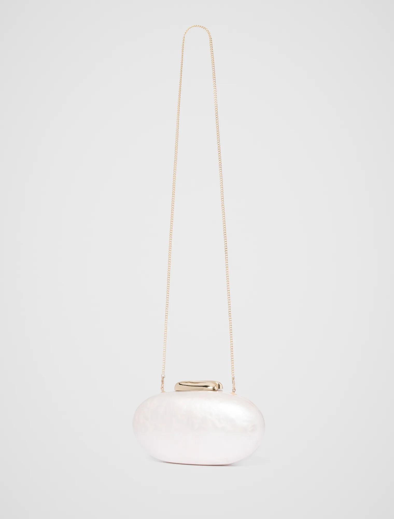 Patty Oval Pearl Hardcase Clutch_mannequin