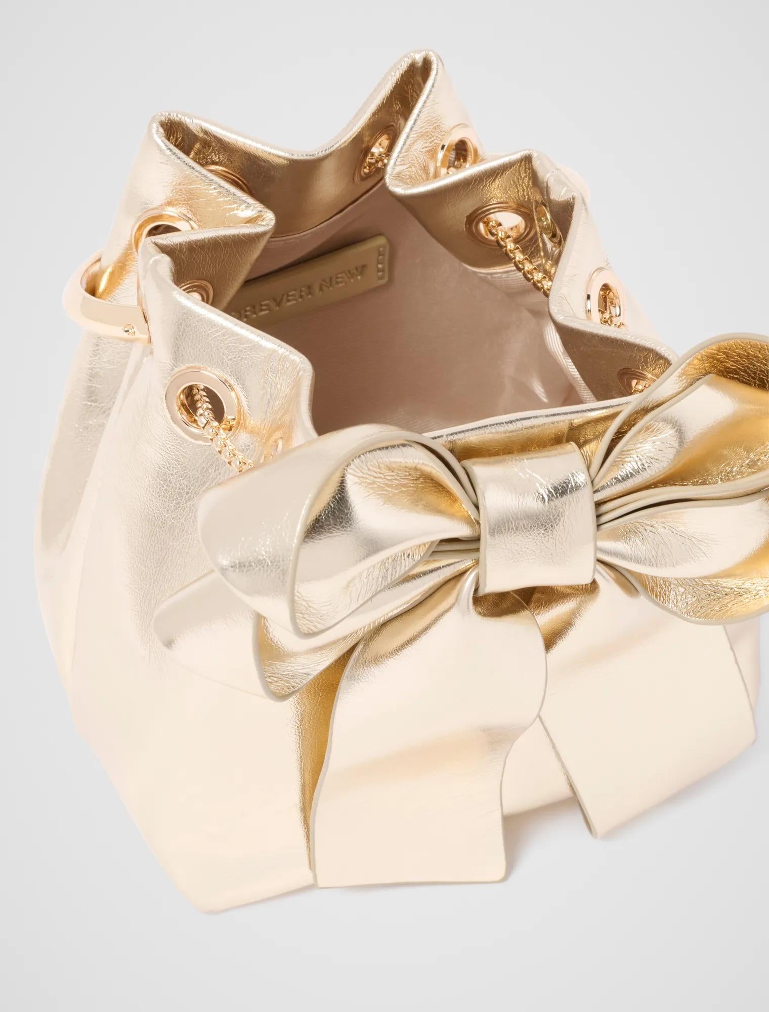 Petra Bow Metal Handle Bag Gold_mannequin