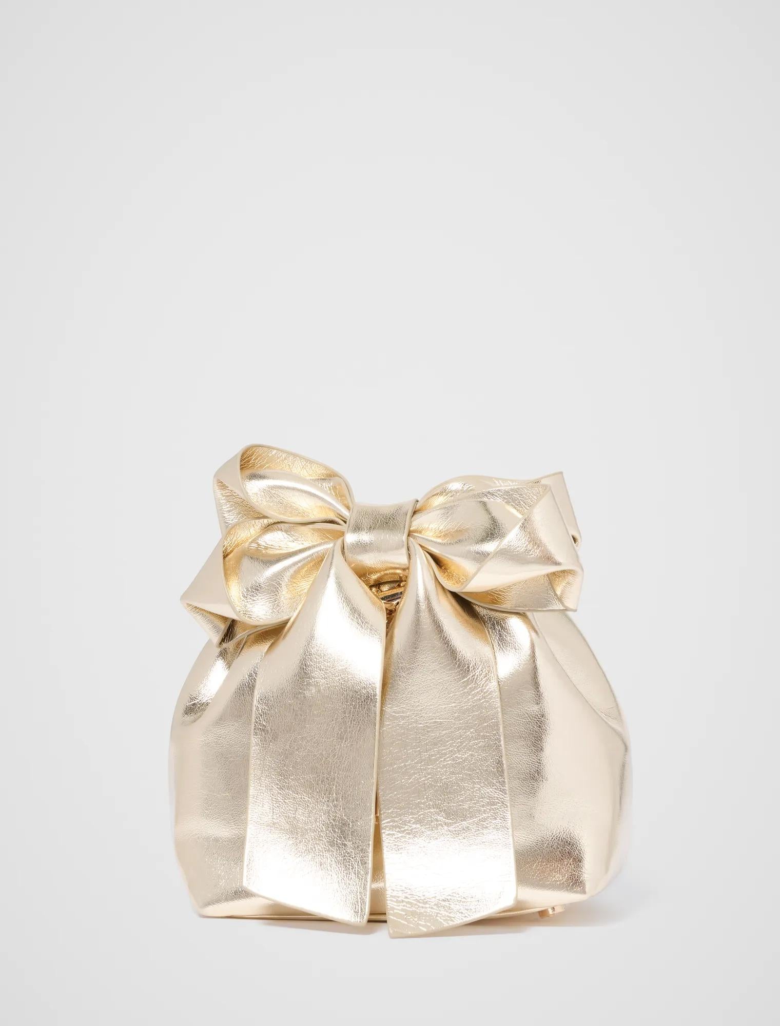 Petra Bow Metal Handle Bag Gold_mannequin