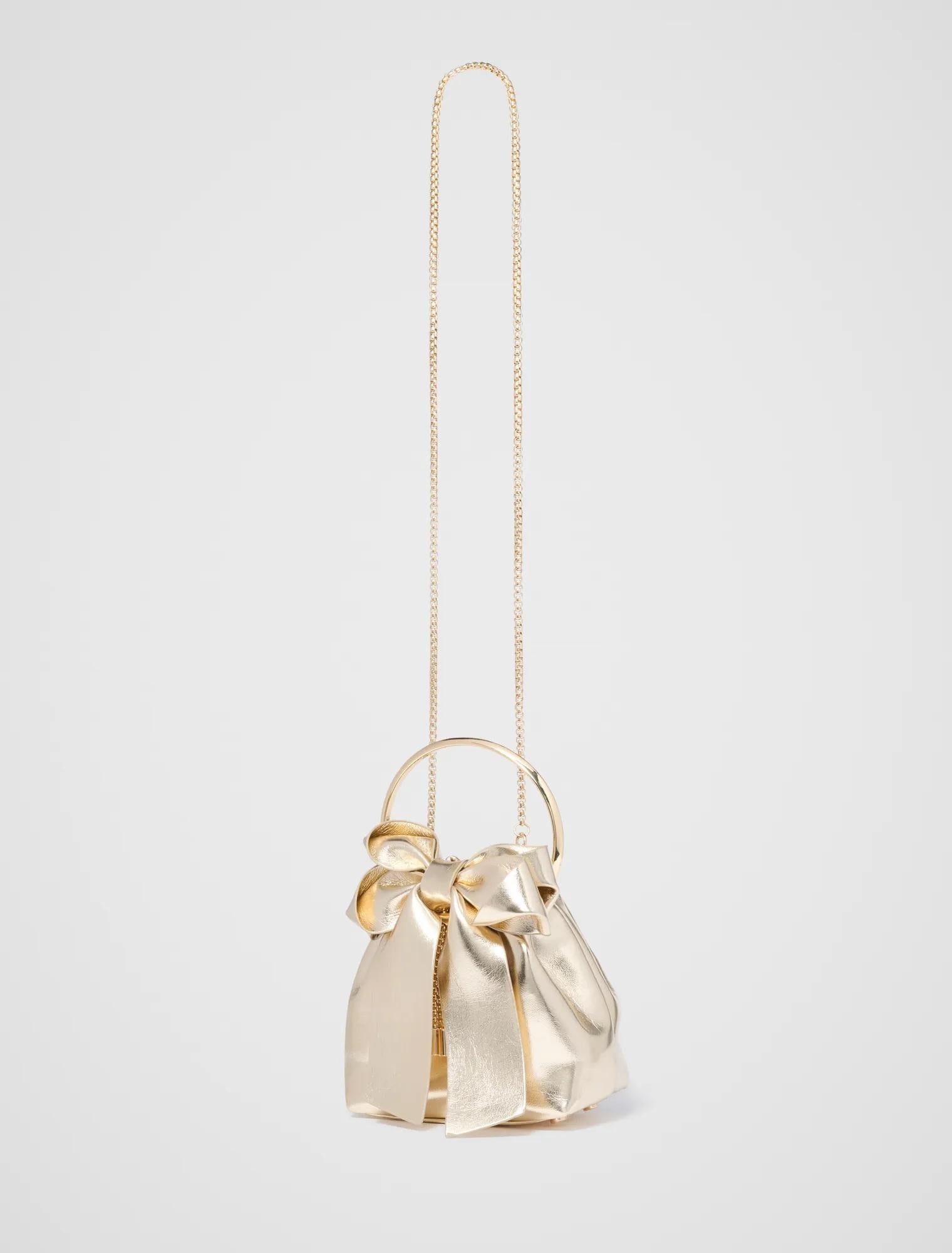 Petra Bow Metal Handle Bag Gold_mannequin