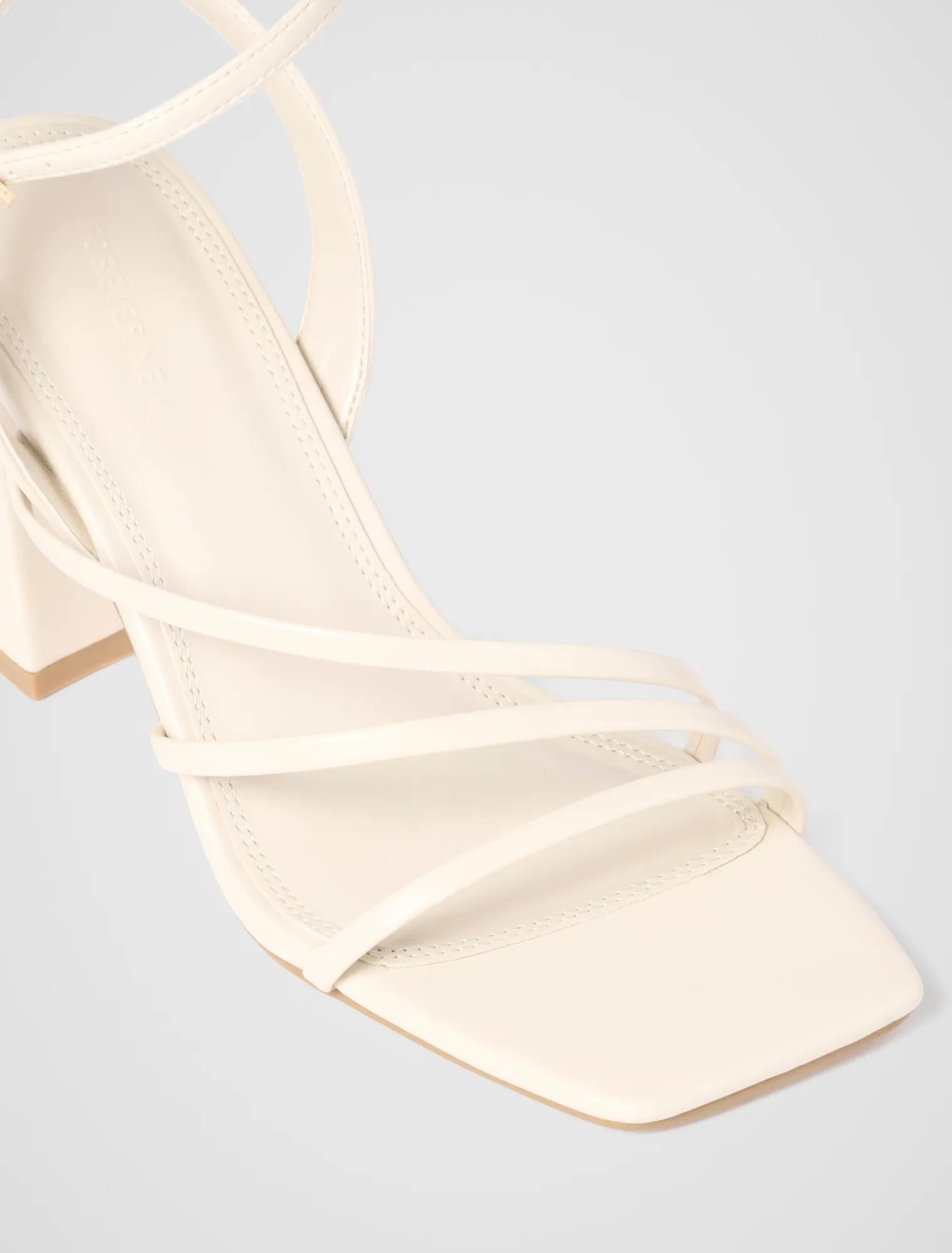 Beth Block Heel Asymmetrical Sandals Ivory_mannequin