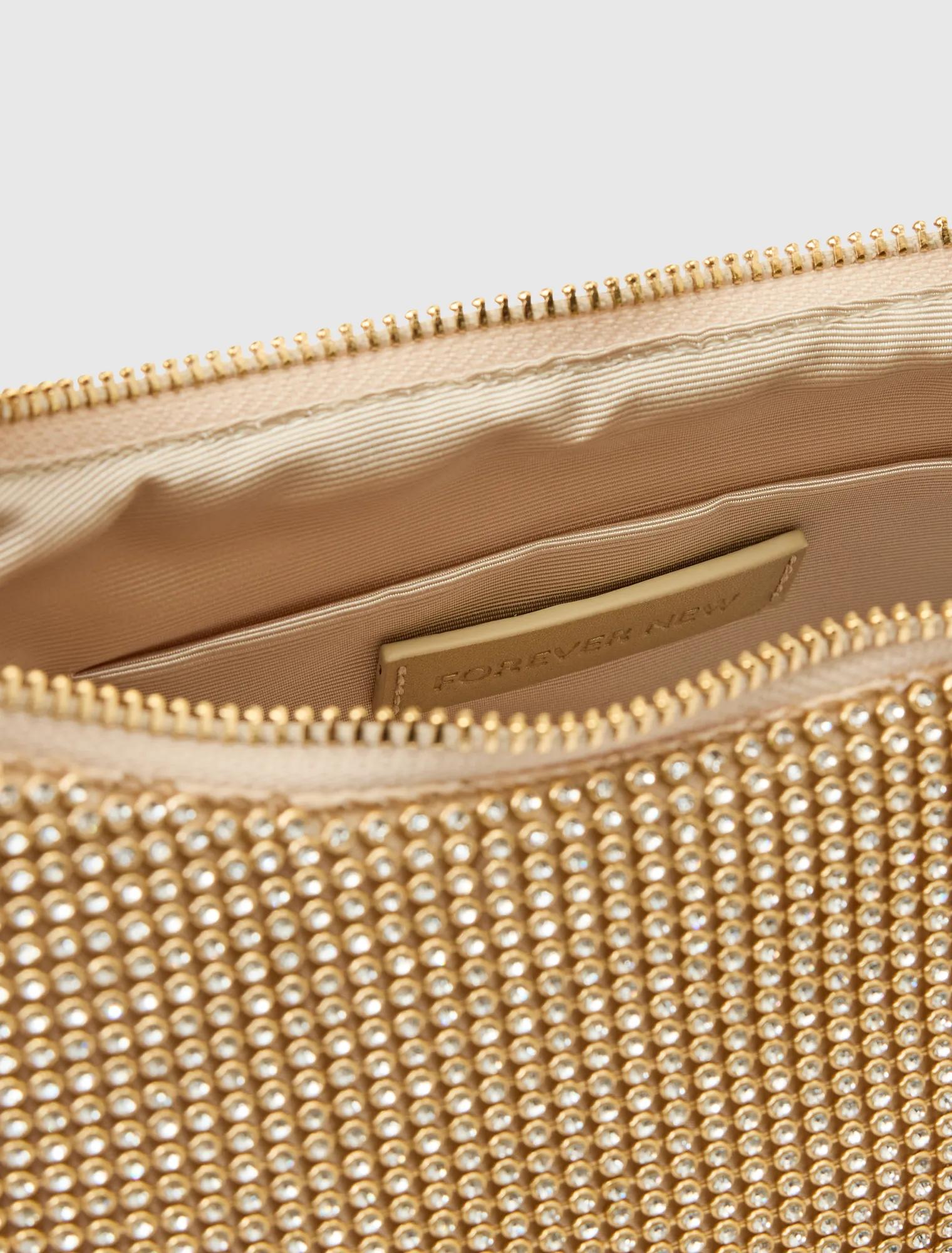 Paloma Curve Clutch Gold_mannequin