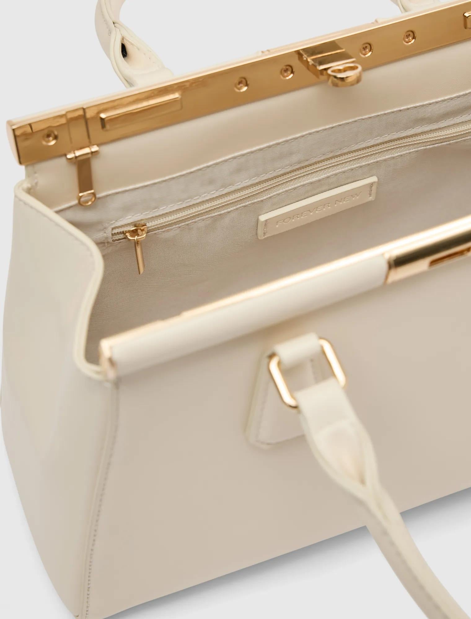 Marie Medium Lock Grab Bag Ivory_mannequin