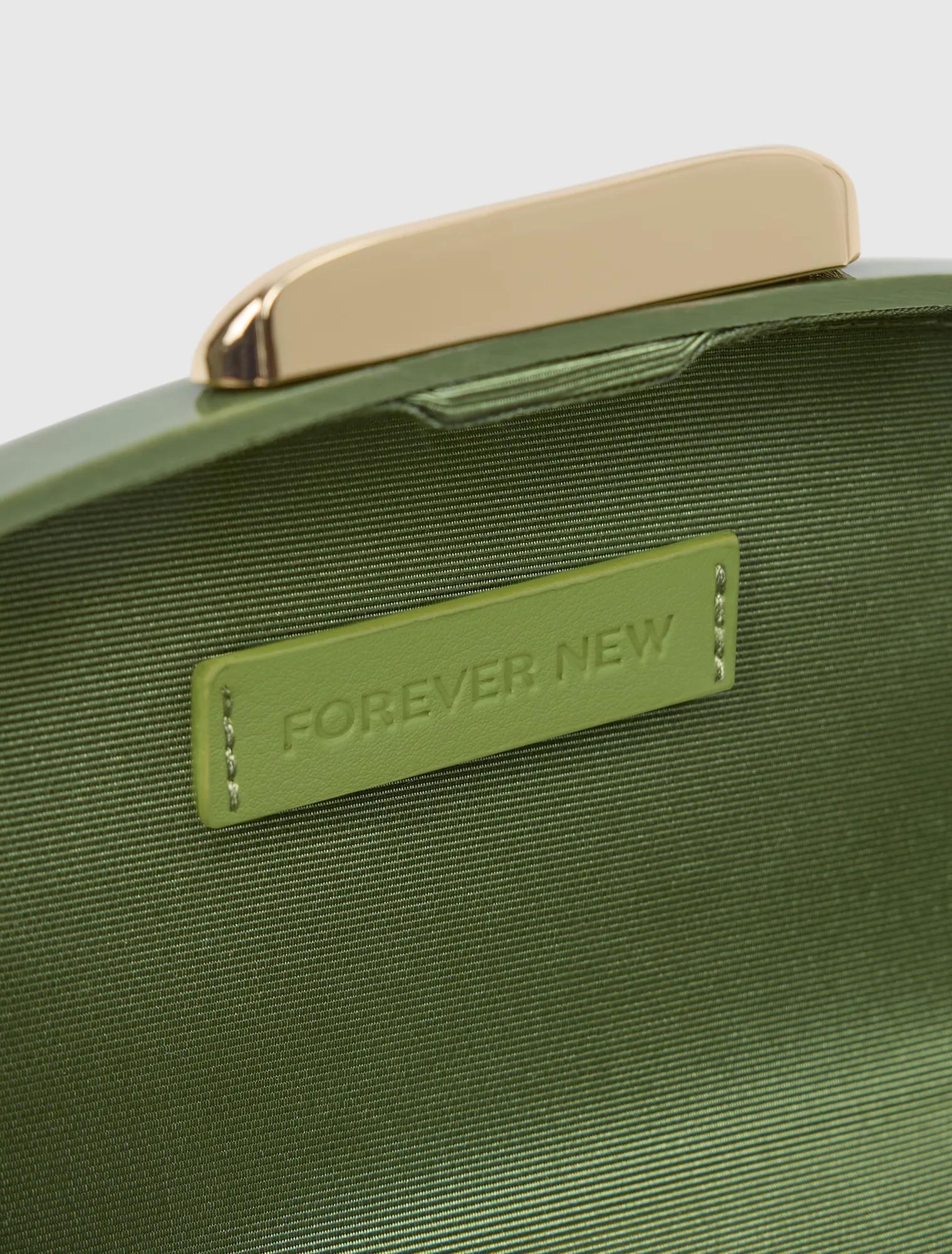 Peyton Oval Hardcase Clutch Sage Olive_mannequin