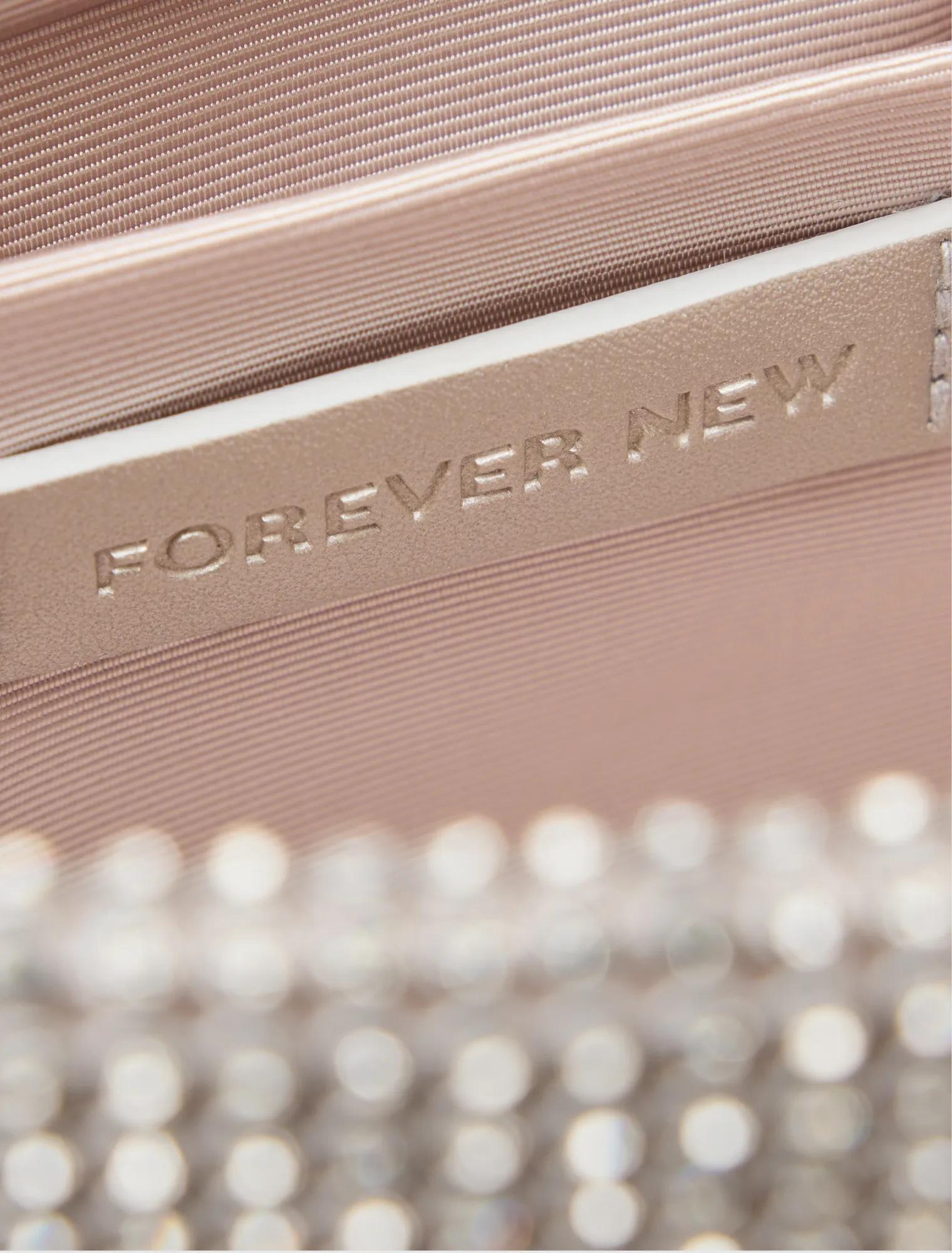 Keisha Soft Sparkle Clutch Silver_mannequin