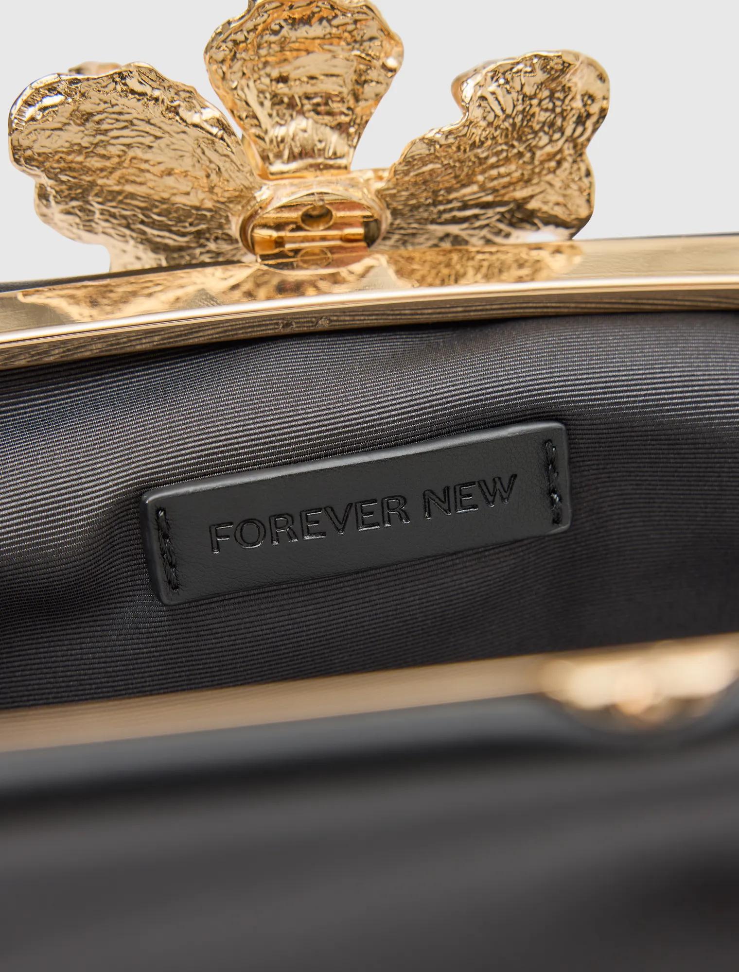 Tiffany Orchid Clasp Clutch Black_mannequin