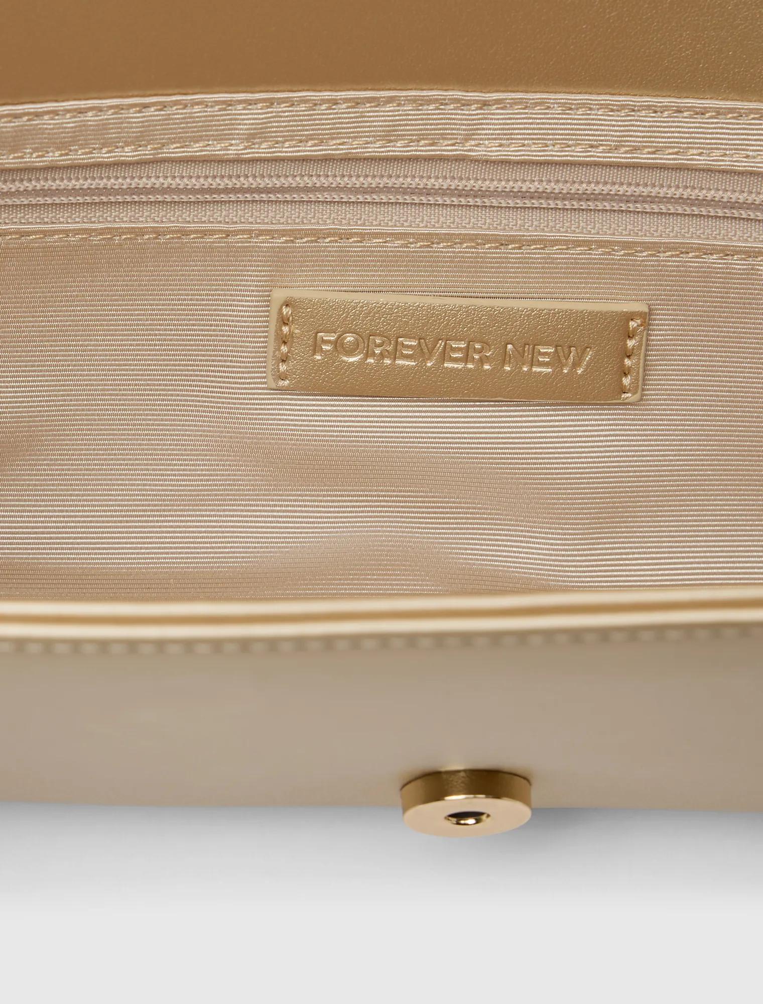 Danielle Elongated Clutch Soft Gold_mannequin