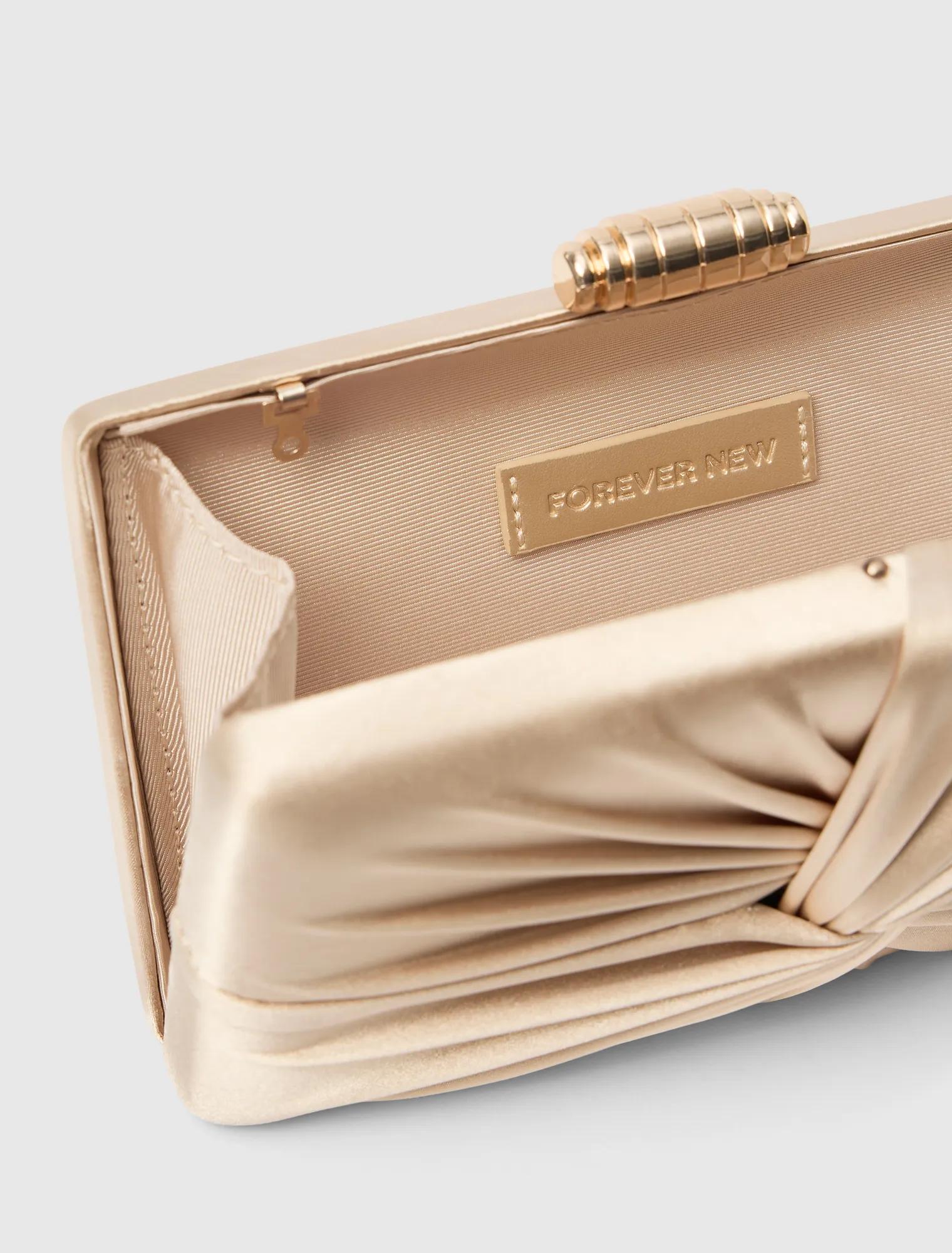 Tate Twist Satin Hardcase Clutch Gold_mannequin