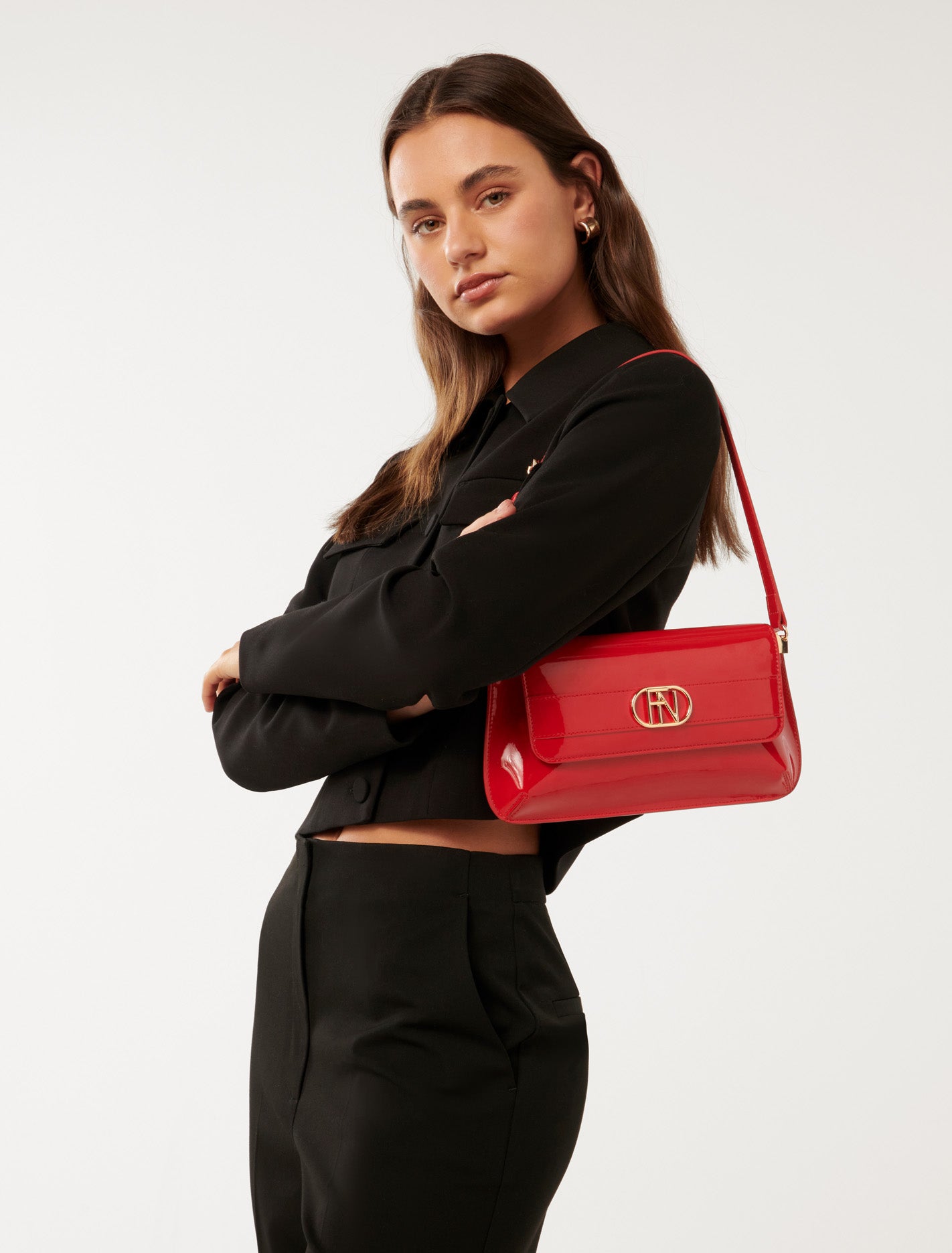 Signature Shiloh Baguette Bag Red Patent_mannequin