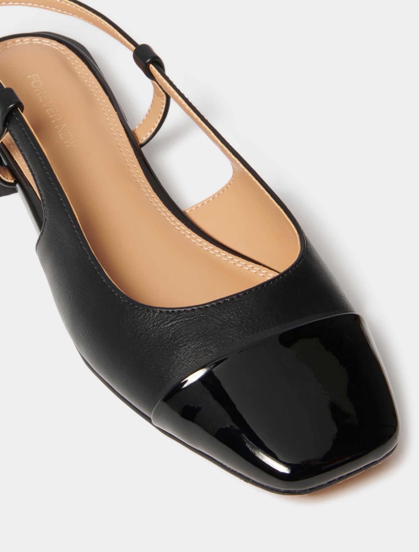 Lorelei Toe Cap Slingback Black_mannequin