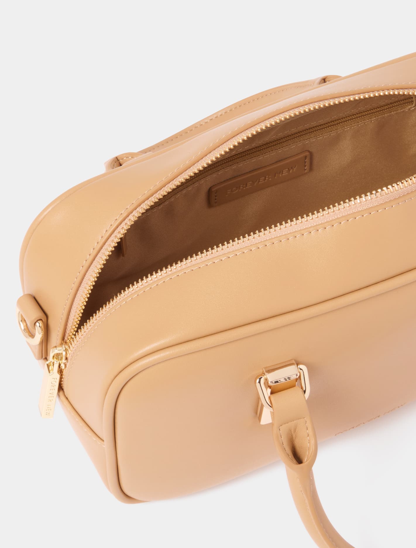 Signature Terri Metal Trim Barrel Bag Tan_mannequin