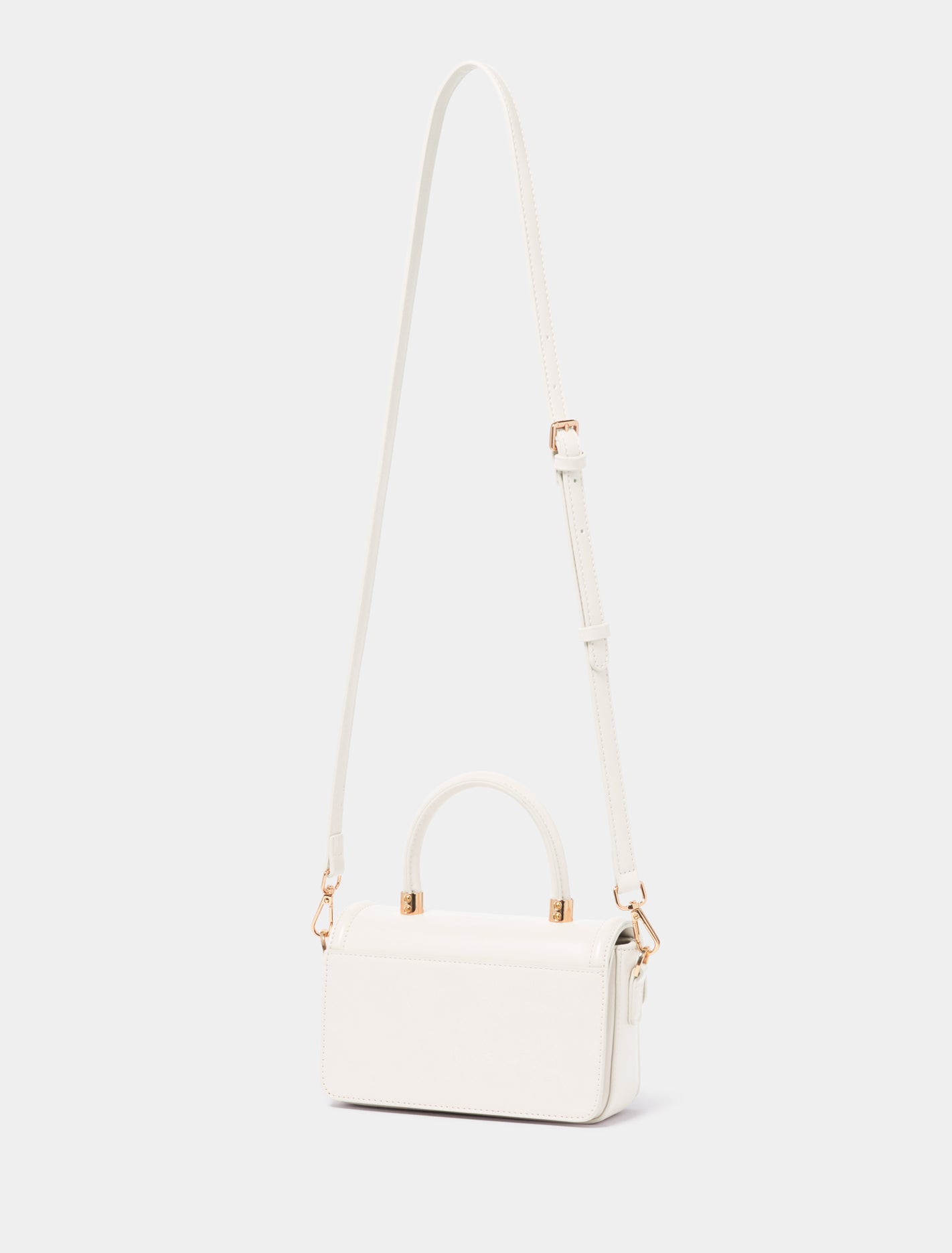 Percy Mini Lock Top Handle Bag Ivory_mannequin