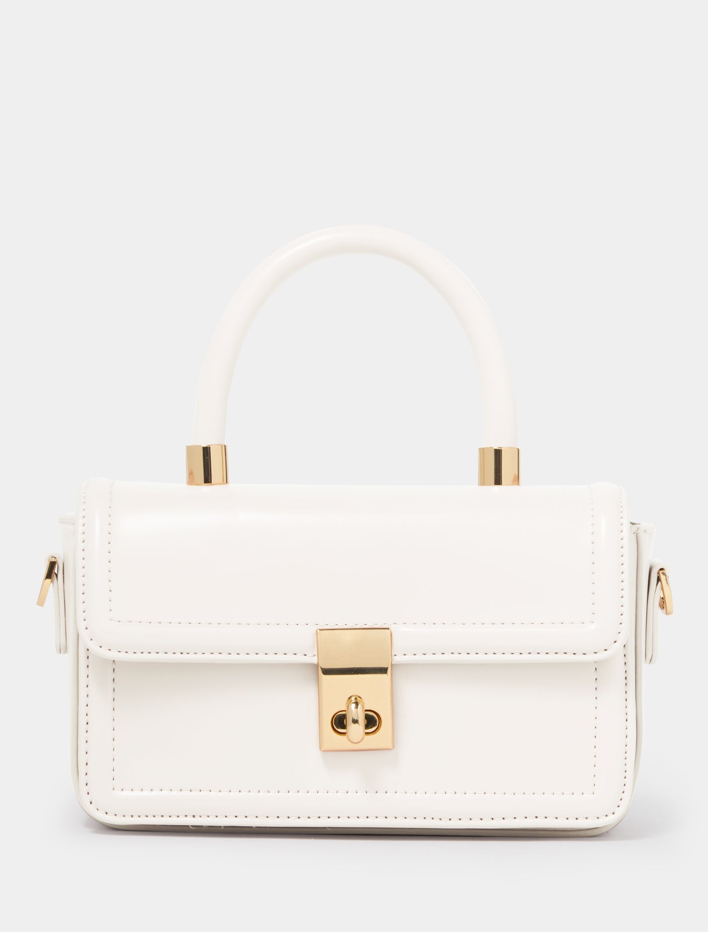 Percy Mini Lock Top Handle Bag Ivory_mannequin