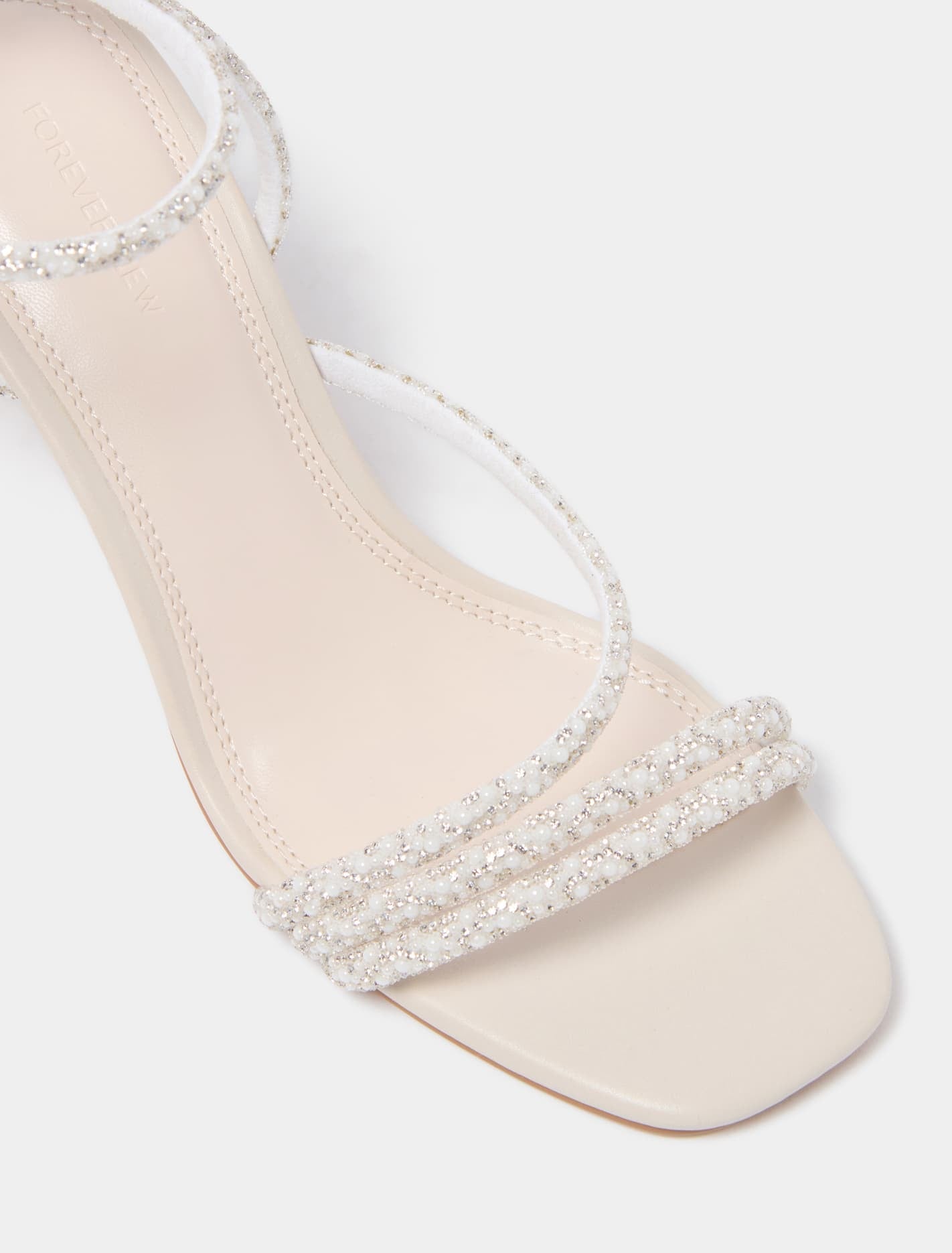 Penelope Asymmetrical Pearl Trim Heels Ivory_mannequin